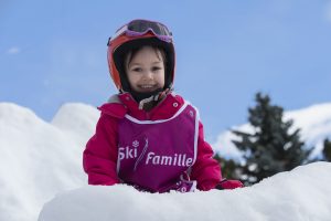 child on ski slopes