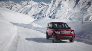 family traveller car on snow