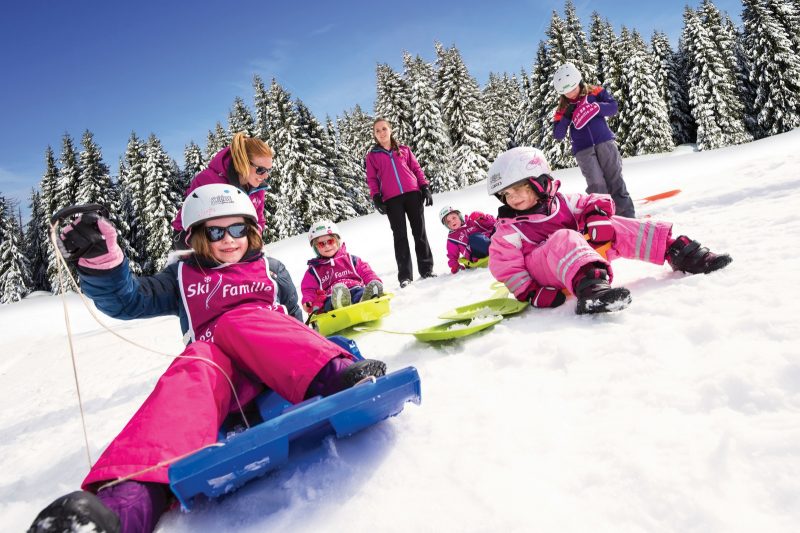 children on ski slopes