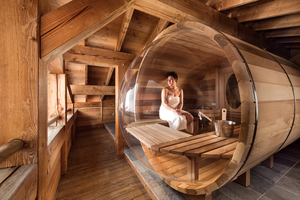 Woman in chalet sauna